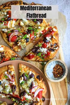 the homemade mediterranean flatbread pizza is ready to be eaten