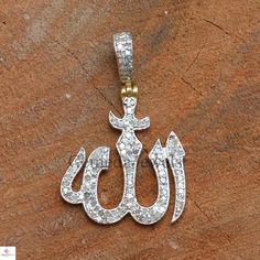 925 Sterling Silver Jewelry, Pave Diamond Allah Pendant, Handmade Silver Charm Pendant Necklace, Allah Sign Religious Pendant Jewelry, Gifts Pendant Details: Item Code: GJ-P297 Diamond Weight : 0.98 Cts Gross Weight: 2.90 Grams Pendant Size: 33X22 MM NOTE:- All The Products Are Designed And Manufactured In My Workshop By Me & My Team. Shown Products Are Purely Handmade. Custom Orders Are Open Handly Accepted. We Are Perfect Choice For Any Custom Jewelry Manufacturing. For Bulk Orders Please Silver Engraved Diamond Custom Necklace, Custom Silver Diamond Necklace Engraved, Custom Silver Diamond Engraved Necklace, Silver Diamond Jewelry With Charms, White Diamond Spiritual Jewelry, Spiritual White Diamond Jewelry, Symbolic Silver Diamond Jewelry, Spiritual Silver Diamond Necklace, White Diamond Jewelry With Charms