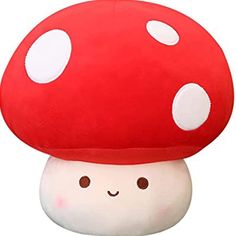 a red mushroom with white dots on it's head and eyes, sitting next to a