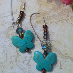 Turquoise Butterfly With Glass Beads Drop Earrings. One Of A Kind. Handmade Turquoise Beaded Earrings With Czech Glass, Turquoise Earrings With Colorful Czech Glass Beads, Nickel-free Turquoise Jewelry For Crafting, Turquoise Czech Glass Beaded Earrings For Pierced Ears, Turquoise Beaded Earrings With Colorful Czech Glass, Turquoise Beaded Earrings With Czech Glass, Turquoise Wire Wrapped Beaded Earrings As Gift, Turquoise Beaded Earrings In Czech Glass, Handmade Turquoise Butterfly Jewelry