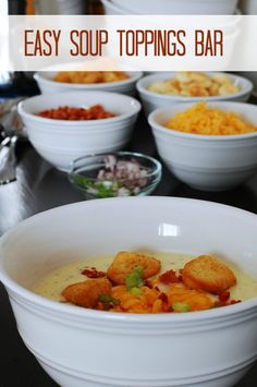 several bowls filled with soup sitting on top of a table