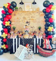 a pirate themed birthday party with balloons and decorations