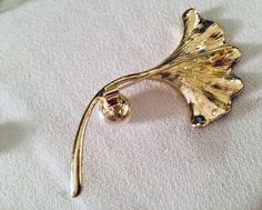 Elegant Pink Glittered Gilded Lily With a Creamy Faux Pearl Goldtone Art Deco Style Fashion Jewelry Brooch Will arrive gifted nicely 🎀 www.mysoulrepair.com Gold Holiday Brooch Jewelry, Gold Brooches For Formal Christmas Occasion, Gold Christmas Brooches For Formal Wear, Elegant Gold Brooches For Christmas, Elegant Gold Christmas Brooches, Elegant Gold Brooches For Festive Occasions, Gold Glamorous Party Brooch, Glamorous Gold Party Brooches, Gold Glamorous Party Brooches