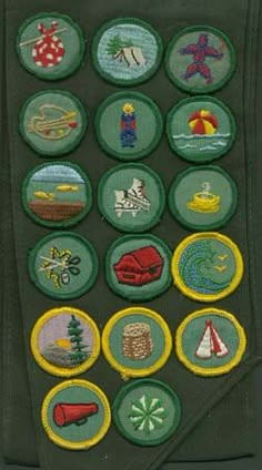 a green jacket with many different patches on it