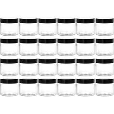 many glasses are lined up in rows with black rims on the top and bottom