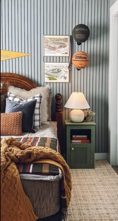 a bed room with a neatly made bed next to a night stand and two lamps