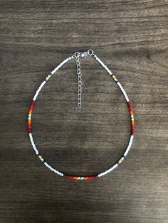 "This seed bead choker is strung on flexible wire which makes it strong and comfortable. It will not stretch out or lose shape over time.  It features a lobster claw clasp and a 2\" extension chain so you can adjust the length to your liking.  If you would like to further adjust the length, there is an option to add a note to the seller at checkout. Please add your desired length there :) Please keep in mind that you are looking at this product through a screen so colors may vary slightly. I am happy to help with any questions/concerns, so feel free to reach out and I'll be in touch! Because this item is made to order, I will not be accepting returns. If the item is broken or damaged upon arrival, contact me and we will get it worked out" Seed Bead Necklace Patterns Western, Beaded Necklace For Men Western, Western Beaded Jewelry, Western Chokers, Western Diy, Western Fashion Jewelry, Country Necklace, Simple Beaded Necklaces, Western Bracelets