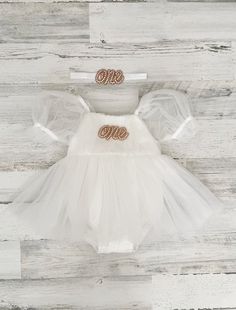 This listing is for a soft white tutu dress, and your option of matching headband!  Perfect for that 1st birthday!!  ~headband elastic can be made in any color! ~ ships within 1 to 3 business days (message me with any additional questions)! ~ headband backed with felt for comfort {{SIZING}}  6-9 months (fits 18-20 lbs.) 9-12 months (fits 20-22 lbs.) 12-18  months  (fits 22-26 lbs.) 18-24 months  (fits 26-30 lbs.)  Don't forget to like my Facebook page for 10% off coupon https://www.facebook.com/ White Tutu Dress For First Birthday In Summer, White Cute Tutu Dress For First Birthday, White Ruffles Tutu Dress For First Birthday, White Ruffled Tutu Dress For First Birthday, White Fitted Dress With Matching Headband, White Tulle Tutu Dress For Cake Smash, White Tutu Dress, Boho Cake, Baby Girls Dresses