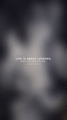 a blurry photo with the words life is about lessons, not perfectionion written on it