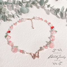 Step into a world of fairy enchantment and cottagecore beauty with our Fairy Blossom Choker Necklace.  Immerse yourself in the allure of a beautiful garden, where delicate pink crystal butterflies dance among blossoms and glass beads, creating a whimsical accessory that captures the essence of fairy tales and cottagecore dreams. 🎀 Key Features: Fairy and Cottagecore Aesthetic: Inspired by the magical beauty of fairy realms and the tranquility of cottagecore aesthetics, this necklace brings an ethereal touch to your style. Pink Crystal Butterfly Centerpiece: A focal point of charm, a pink crystal butterfly takes center stage, surrounded by a delightful arrangement of pink glass beads and flowers, evoking the spirit of an enchanted garden. Perfect for Garden-inspired Elegance: Whether you'r Cottagecore Beauty, Cottagecore Prom, Butterfly Centerpiece, Crystal Butterflies, Butterfly Centerpieces, Prom Necklace, Ethereal Jewelry, Prom Necklaces, Whimsical Accessories