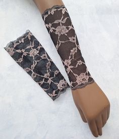 Add a touch of elegance to your outfit with this long lace bracelet. Made with a combination of polyester and spandex material, this wrist cuff fits snugly and comfortably on your wrist, giving you a stylish look.  Bracelet length: 9.05 inches (23 cm) SIZE CHART: Women's wrist circumference S - 6.3" - 6.7" (16 - 17cm) M -6.7" - 7.5" (17 - 19cm) L - 7.5"- 8" (19 - 20cm) The lace fabric type and wrist glove length make it perfect for women who want to add a delicate touch to their clothing accesso Wrist Cuff Tattoo, Cuff Tattoo, Tattoo Cover Up, Lace Bracelet, Tattoo Cover, Tattoo Cover-up, Old Rose, Rose Lace, Wrist Cuffs