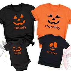 Custom Family Pumpkin Face Shirt, Halloween Family Matching Tshirt, Halloween Mom Dad Childs Shirts, Pumpkin Family Outfit, Spooky Party Tee The Pumpkin Face Halloween Shirt is the perfect way to bring spooky fun to your Halloween celebrations! Our Family Matching Halloween Tshirt is ideal for creating memorable moments with loved ones. Whether you're attending a Halloween party or just want to get into the festive spirit, our Halloween Party Group Shirts ensure everyone looks coordinated and st Black Cartoon Print Shirt For Halloween, Family Matching Black Tops For Halloween, Halloween Character Print Tops For Costume Party, Black Family Matching Tops With Character Print, Family Matching Halloween Shirts, Family Matching Black Tops With Character Print, Halloween Costume Party T-shirt With Letter Print, Halloween Costume Party Letter Print T-shirt, Orange Letter Print Shirt For Halloween