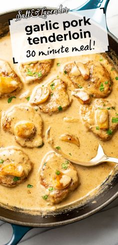 a skillet filled with chicken and gravy on top of a white counter