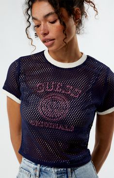 Elevate your athleisure look with the GUESS Originals Mesh Short Sleeve Jersey. Crafted from semi-sheer mesh fabric, this jersey features contrast trimming for a sporty touch. With its cropped fit, it offers both style and comfort for your active lifestyle.


	Solid color tee
	Sheer mesh fabric
	Good stretch
	Short sleeves
	Crew neckline
	Contrast trimming
	Logo graphic
	Cropped length
	Model is wearing a size small
	Model measurements: 5’7” height, 32” bust, 24” waist, 35” hip Casual Mesh Crew Neck Tops, Mesh Sleeve Tops For Sports, Trendy Crew Neck Mesh Top, Casual Short Sleeve Mesh Top, Spring Mesh Athleisure Tops, Spring Mesh Tops For Athleisure, Sporty Summer Activewear With Contrast Trim, Sporty Tops With Mesh Sleeves For Spring, Sporty Mesh Top For Summer