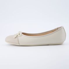 Meet Cardi, a cap toe ballerina flat. Slip into these bow-adorned flats crafted from soft vegan leather with a durable outsole. Cardi's memory foam padding will keep you feeling supported all day long, while its unique cap toe and bow design add a touch of fresh style. Cream Leather Ballet Flats For Spring, Casual Leather Ballet Flats With Bow, Cream Leather Ballet Flats For Work, Beige Faux Leather Flats For Spring, Spring Beige Faux Leather Flats, Spring Season Beige Faux Leather Flats, Cream Round Toe Ballet Flats For Work, Beige Leather Ballet Flats For Spring, Spring Cream Ballet Flats For Workwear