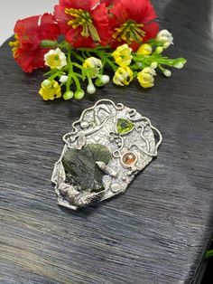 "ARTISAN MOLDAVITE GEMSTONE PENDANT Hand-made Sterling Silver 925. Stones used: Moldavite, Peridot, Sapphire. Height -2\" (with bail), Width - 1 1/2\" Height - 55mm, width-38mm. Unique Handcrafted One-of a-kind Design Pendant Each Piece of Jewelry in my Collection is Absolutely One of a Kind! When you start wearing a piece of my jewelry you will fall in love with it more and more each day and feel that good Energy and Love that I pass into it while creating this piece of Art. A piece of Art crea Moldavite Pendant, Meteorite Pendant, Amber Gemstone, Amber Ring, Mismatched Earrings, Unique Gemstones, Good Energy, Stone Earrings, My Collection