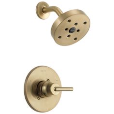 the shower faucet is shown in brushed brass