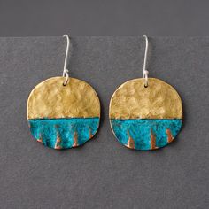 These classy minimalistic drop earrings are perfect for daily wear as well as evening outfit. Reminding of beach sands and waves these homemade earrings will be a modern artisan jewelry gift for any sea lover.  They are made of hammered brass and copper with natural blue patina. Ear wires are made of sterling silver. These shapes are free formed and may vary subtly. Available in two diameters, please see the sizes comparison on the last photo.  Sizes: bigger earrings: 1.1"x1.8" total length with Minimalist Handmade Drop Earrings, Artsy Earrings For Summer Beach Occasions, Artsy Earrings For Summer Beach Outings, Artsy Earrings For Beach In Summer, Artsy Earrings For Beach And Summer, Minimalist Sterling Silver Earrings For Summer, Handmade Artsy Summer Jewelry, Artsy Summer Earrings With Ear Wire, Unique Round Earrings For Beach