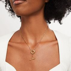 Curate your collection of easy-to-style accessories with this Soko Obiti Lariat necklace. Brass with 24K gold plate This lariat design features a toggle clasp - suspended beneath a chain dangle that threads through an open circle 19.53-inch paperclip chain; toggle clasp Handcrafted by artisans in Kenya using traditional techniques Designed for and exclusively available at Zales Gold-tone Brass Jewelry With Toggle Clasp, Minimalist Gold Plated Toggle Necklace, Gold Minimalist Jewelry With Toggle Clasp, Minimalist Gold Jewelry With Toggle Clasp, Brass Toggle Necklace Gift, Elegant Toggle Necklace Tarnish Resistant, Minimalist Gold Toggle Necklace For Formal Occasions, Elegant Gold Toggle Long Necklace, Elegant Brass Toggle Clasp Necklace