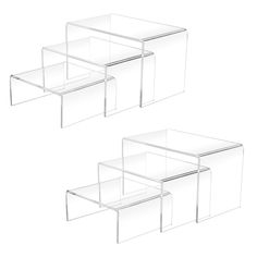 three clear acrylic boxes sitting next to each other