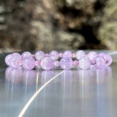 "Beautiful Lavender Amethyst Gemstone Bracelet!The Amethyst beads are Grade AA and have a light lavender color and lovely clarity🤩 It is paired with faceted Czech Fire Polish glass💜 Amethyst is a stone perfect for all Spiritual pursuits💜 Comes packaged in a gift box with info cards. A perfect gift ready to go! All our bracelets are handmade by our team☺️ Be sure to favorite our shop and check for updates for new bracelet releases Bracelet sizes: 7\" (fits small wrists) 7.5\" (fits medium wris Pink Amethyst Healing Bracelets, Lavender Amethyst Crystal Bracelet As Gift, Pink Amethyst Bracelets For Healing, Pink Amethyst Healing Bracelet, Lavender Amethyst Beaded Bracelets For Meditation, Lavender Crystal Bracelet With 8mm Beads As Gift, Pink Amethyst Crystal Bracelet For Healing, Spiritual Pink Amethyst Beaded Bracelet, Lavender Gemstone Beaded Bracelets For Meditation