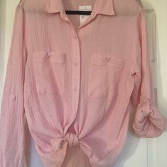 This Nwt Beautiful Blouse By Sanctuary Is A Size Small. It Has A Slight Pattern And Has An Almost Gauze Feel. It Is Lightweight And Perfect For Summer. Can Be Tied Or Worn Down And Sleeves Can Be Rolled And Buttoned. Purchased At Nordstrom. Pink Button-up Beach Top, Pink Buttoned Beach Blouse, Pink Beach Tops With Button Closure, Chic Pink Tops With Button Closure, Chic Pink Top With Button Closure, Pink Blouse With Buttons For The Beach, Casual Pink Blouse With Button Closure, Chic Long Sleeve Peach Top, Chic Peach Long Sleeve Tops