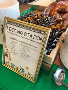 there is a feeding station sign on the table