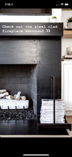 the fireplace is black and white with a sign above it that reads, check out the steel clad fireplace surround 39