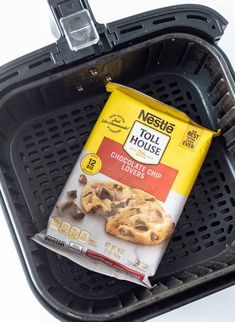 a bag of nestle toll house chocolate chip cookies sitting on top of a plastic container