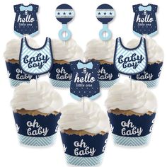 blue and white cupcakes with bib toppers for baby's first birthday