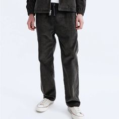 This Drawstring Trouser Is Handcrafted From A Wide Wale Cotton Corduroy. Designed With A Straight Leg, Elasticated Waistband, Satin Stretch-Lined Hand Pockets, And A Rear Patch Pocket Size M. Casual Corduroy Pants With Elastic Waistband, Washed Black Straight Leg Pants With Elastic Waistband, Relaxed Fit Corduroy Bottoms With Elastic Waistband, Casual Corduroy Bottoms With Elastic Waistband, Spring Corduroy Streetwear Pants, Spring Corduroy Pants For Streetwear, Washed Black Straight Cotton Pants, Washed Black Relaxed Fit Pants For Winter, Relaxed Fit Washed Black Pants For Winter