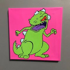 a painting of a green dinosaur on a pink background with white flowers in it's mouth