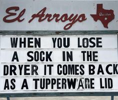 a sign that says when you lose a sock in the dryer it comes back as a tupperware lid