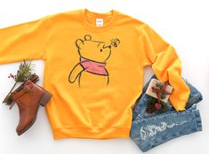 ladies fashion ideas Image# 1544470128 #ladiesfashionideas Winnie The Pooh Sketch, Pooh Sketch, Disney Sweatshirt, Disneyland Outfits, Design Page, Womens Disney Shirts, Disney World Shirts, Disney Inspired Outfits