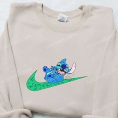 a white sweatshirt with an image of stitching on it