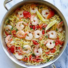 pasta with shrimp and tomatoes in a pan