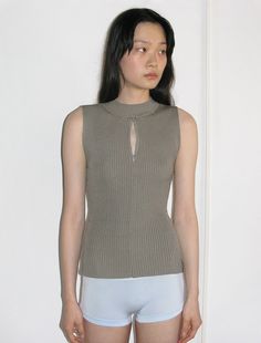 Knitted sleeveless top with zip and silicone label details. Textured Tops Women, Knitted Sleeveless Top, Sustainable Fashion Designers, Outfit References, Paloma Wool, Clothing Pieces, Knit Fashion, Paloma, Fashion Inspo Outfits