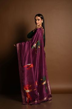 Featuring intricate Zari abstract motifs, this luxurious handloom silk saree in wine purple is perfect for making a sophisticated statement. Ideal for special occasions. Purple Handloom Pre-draped Saree For Diwali, Elegant Purple Chanderi Pre-draped Saree, Purple Handloom Chanderi Pre-draped Saree, Traditional Purple Cotton Silk Pre-draped Saree, Festive Purple Cotton Silk Pre-draped Saree, Festive Purple Pre-draped Cotton Silk Saree, Festive Purple Tussar Silk Pre-draped Saree, Purple Cotton Silk Pre-draped Saree, Purple Silk Handloom Pre-draped Saree