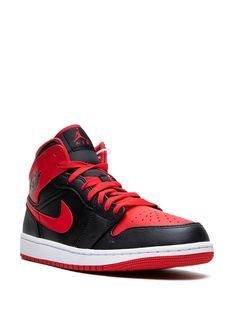 "Find JORDAN Air 1 Mid \"\"alternate Bred\"\" Sneakers on Editorialist. black/white/ fire red canvas/leather logo patch at the tongue signature Swoosh logo detail front lace-up fastening round toe flat rubber sole These styles are supplied by a premium sneaker marketplace. Stocking only the most sought-after footwear, they source and curate some of the most hard to find sneakers from around the world." Custom Lace-up Sneakers With Logo Patch For Streetwear, Leather Jordan Shoes With Laces For Streetwear, Lace-up Basketball Shoes With Red Sole For Streetwear, Leather Sneakers With Red Sole For Streetwear, Mid-top Sneakers With Red Sole For Streetwear, Jordan Mid-top Shoes With Red Sole For Streetwear, University Red Leather Sneakers For Streetwear, University Red Leather Sneakers With Laces, Sporty Jordan Shoes With Red Sole For Streetwear