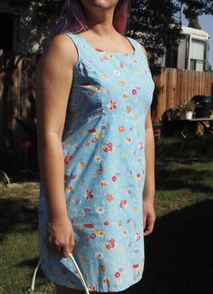 This bright floral dress is super cute and perfect for a unique daisy. It fits as a comfortable size medium cotton day dress. The measurement are included in the pictures. Cute Sundress With Ditsy Floral Print For Garden Party, Cute Ditsy Floral Print Sundress For Garden Party, Cute Ditsy Floral Sundress For Garden Party, Spring Cotton Sundress With Ditsy Floral Print, Cute Cotton Floral Print Sundress, Cotton Fitted Sundress For Garden Party, Fitted Cotton Sundress For Garden Party, Cute Cotton Ditsy Floral Print Dress, Cute Cotton Ditsy Floral Dress