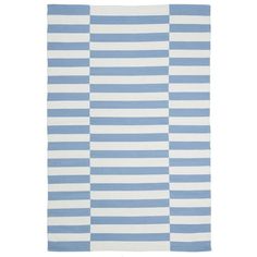 a blue and white rug with horizontal stripes