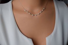 "Pearl Dainty Necklace,Silver Pearl Necklace,Sterling Silver Dainty Necklace,Tiny Pearl Silver Necklace,Layered Necklace,Bridesmaid Jewelry Dainty Silver necklace and Pearl Beads. This simple yet elegant necklace looks great. simple and elegant necklace suitable for every day or evening. *Pearl Necklace *Dainty Silver Necklace *Dainty Pearl Necklace *Silver Delicate Necklace *Silver Pearl Necklace *Layering Necklace *Pearl Beads Necklace *Silver Minimalist Necklace *Bridesmaid Jewelry *Bridesmai Dainty Silver Chain Necklace For Wedding, Delicate Silver Necklace, Dainty Pearl Necklace, Layered Necklaces Silver, Silver Pearl Necklace, Elegant Necklaces, Minimalist Necklace, Delicate Necklace, Dainty Necklace