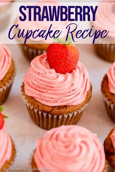 strawberry cupcakes with pink frosting and strawberries on top, in front of the words strawberry cupcake recipe