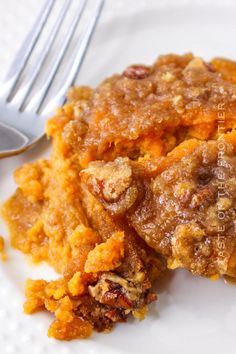 a close up of food on a plate with a fork