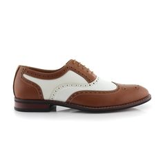 For the final touch to a stand out look, this dress shoe is the one you've been waiting for. Featuring intricate perforations and a classic wingtip design, this brogue will be an instant staple for going out. Collection: Ferro Aldo Classic brogue wingtip with contrast color upper Perforation and stitching details Lace-up closure for an adjustable fit Stacked heel Upper: Faux leather Lining: Faux leather and fabric Brown Low-top Oxfords With Brogue Detailing, Brown Semi-formal Oxfords With Textured Sole, Semi-formal Brown Oxfords With Perforated Toe Box, Arthur Brown, Classic Brown Semi-formal Oxfords, Best Man's Outfit, Masculine Brown Leather Semi-formal Shoes, Stitching Details, Dress Shoe