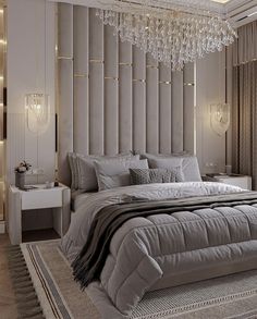 a bedroom with a large bed and white walls