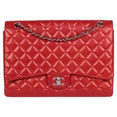 Chanel Red Quilted Lambskin Maxi Classic Single Flap Bag Model- Maxi Classic Single Flap Bag Product Type- Crossbody, Shoulder Serial Number- 13****** Age- Circa 2009 Accompanied By- Chanel Dust Bag, Box, Authenticity Card, Care Booklet, Ribbon Colour- Red Hardware- Silver Material(s)- Lambskin Leather Height- 25cm Width- 33cm Depth- 10cm Strap Drop- Single:49cm Double: 28cm Interior- Red Leather Closure- Turn Lock Country of Origin- France Condition Rating- Very Good Exterior Condition- The exterior is in excellent condition with light signs of use. Interior Condition- The interior is in excellent condition with light signs of use. There are light scratch marks on the interior. Hardware Condition- The hardware is in excellent condition with light signs of use. Corner Condition- The corner Interior Hardware, Number 13, Red Quilts, Bag Model, Ribbon Colors, Lighted Signs, Flap Bag, Lambskin Leather, Fashion Handbags