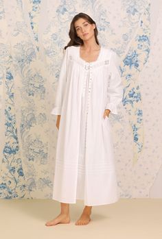 A clean and classic look, this 100% cotton nightgown is designed with a delicate dobby stripe, accented by venise lace at the neckline, pintucks at the neckline and skirt, and a placket of akoya shell buttons. Style Number: E5220079-100 Length: 49 ½" 100% Cotton Dobby Stripe WovenExclusive of ornamentation Model is wearing size S. She is 5'8", Bust 32", Waist 24", Hips 34" Imported Balcony Decking, Clothes Sleep, Ballet Gown, Edwardian Nightgown, Linen Gown, Elegant Wardrobe, Victorian Nightgown, Aesthetic Galaxy, Eileen West