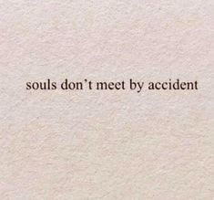 the words are written in black ink on a white paper sheet that says,'souls don't meet by accident '