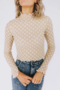 Start fresh with our New Beginnings shirt! This stylish piece features a textured daisy pattern, long sleeves, and a mock turtle neck, plus a lettuce hem for a unique look. Get ready for the new you! Mock Turtle Neck, Lettuce Hem, Mock Turtle, Daisy Pattern, Mock Turtleneck, New You, Top Sales, First Dance, Dance Dresses